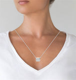 East To West Emerald Cut Moissanite Bezel Set Solitaire Pendant