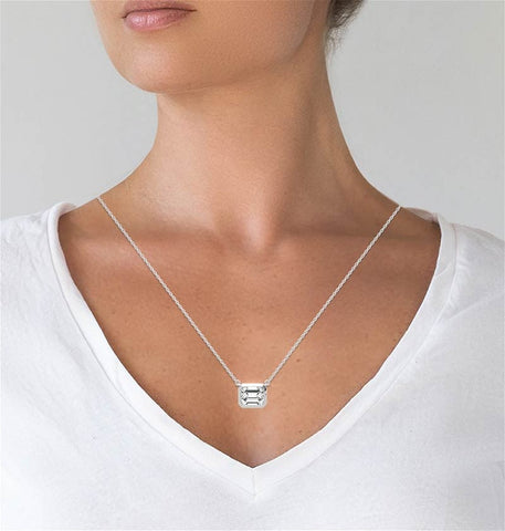 East To West Emerald Cut Moissanite Bezel Set Solitaire Pendant